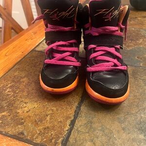 Jordan Kids Black and Pink Sneakers with Orange Accents